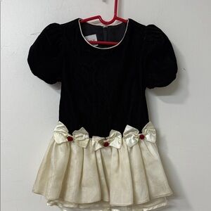 Elegant Black Dress with Cream Accents